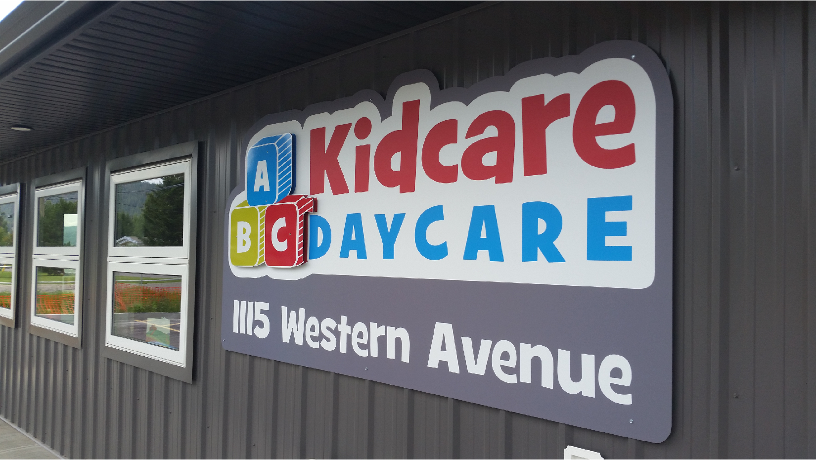 Kidcare Daycare: logo design, sign design and concept with standoffs