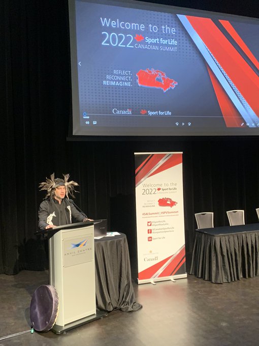 Presentation and 2022 event signage